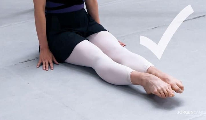 Image of pointed feet and a checkmark